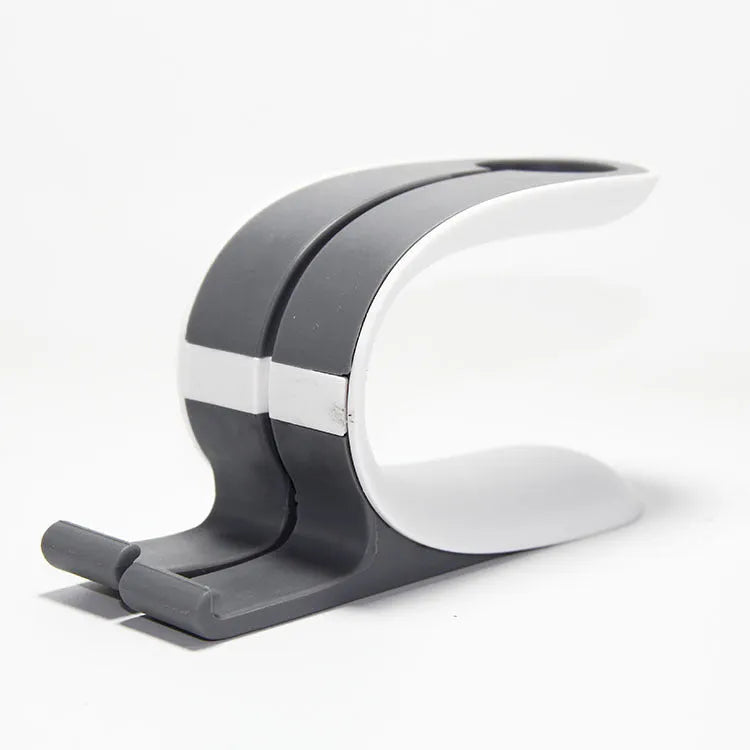 Grey Apple watch and iPhone charging stand on desktop 20cm height