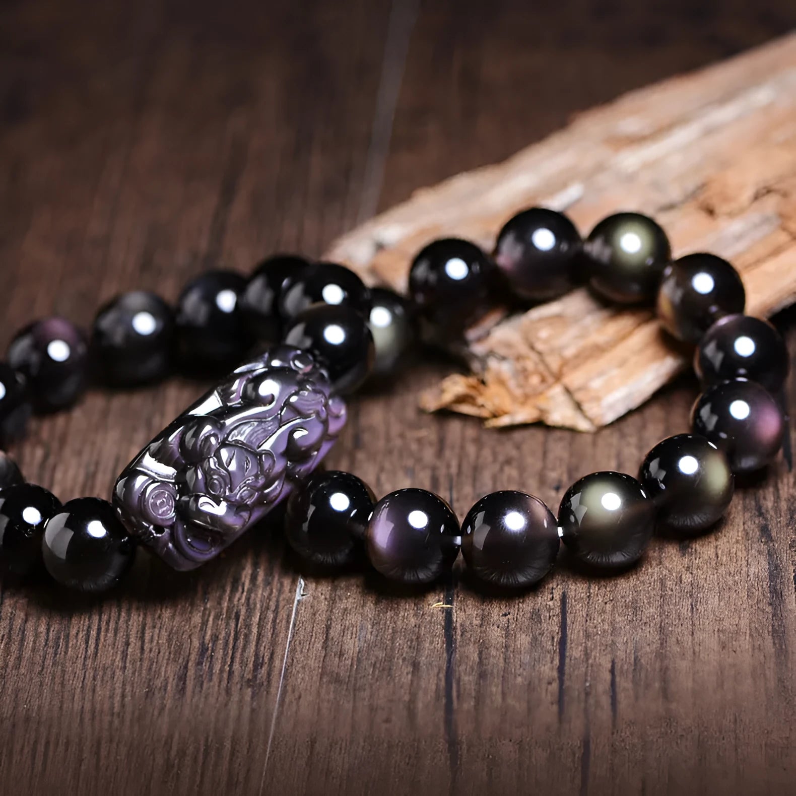 Unisex polished crystal Pi Xiu bracelet in ethnic geometric design with ice stone beads.