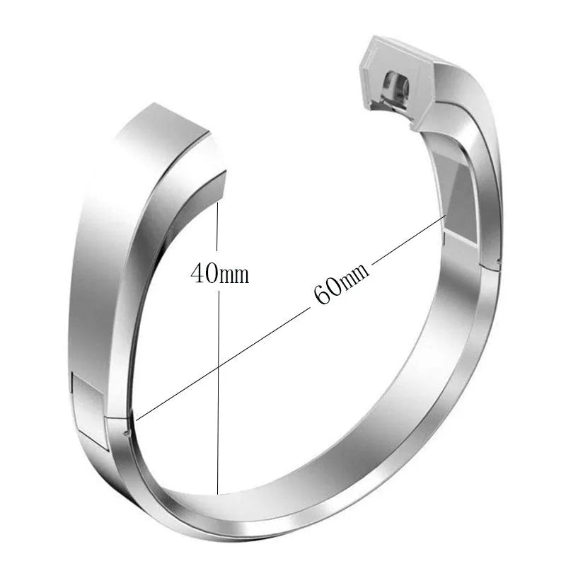 Fitbit Alta smart watch with a stainless steel replacement bracelet strap featuring a deployment buckle, shown in silver finish.