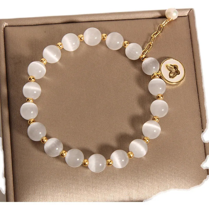 Korean-style white crystal cat's eye bracelet with geometric health care design