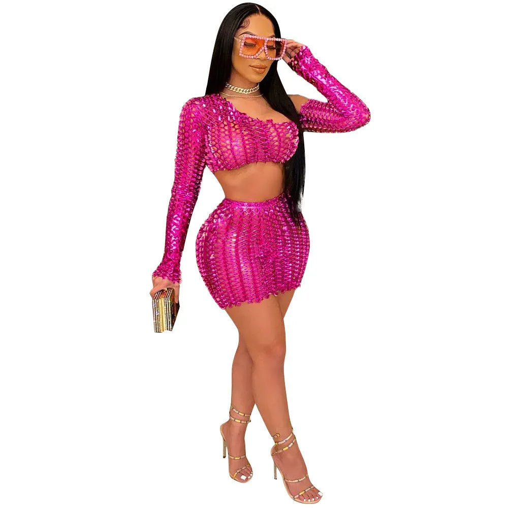 Women's sleeveless hollow-out two-piece dress set in polyester, showing top and short skirt with net hole detail.
