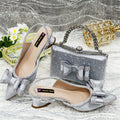Women's pointed toe sandals with rhinestones and matching square bag in wine red colour