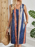 Casual V-neck sleeveless dress with colour-block stripes on a mid-waist, knee-length silhouette.