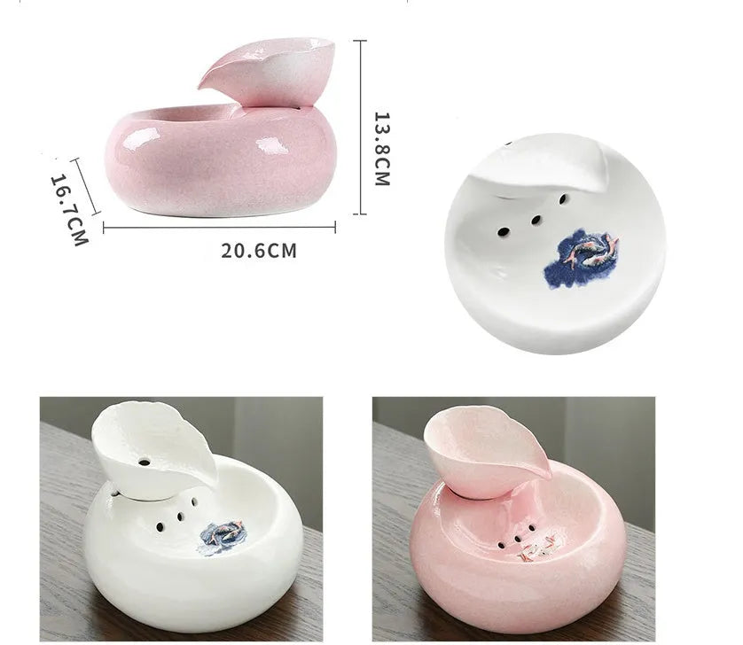 White ceramic automatic cat water dispenser with leaf design and US plug on a wooden floor