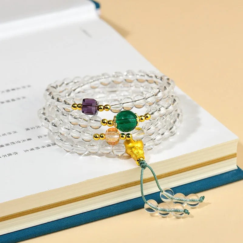 White crystal 108 bead rosary bracelet with geometric ethnic design