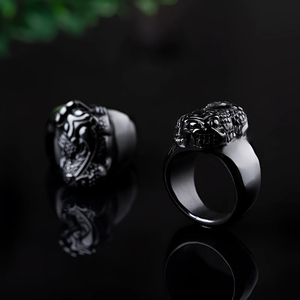 Men's obsidian Pixiu thumb ring showing natural gold sheen crystal on alloy band