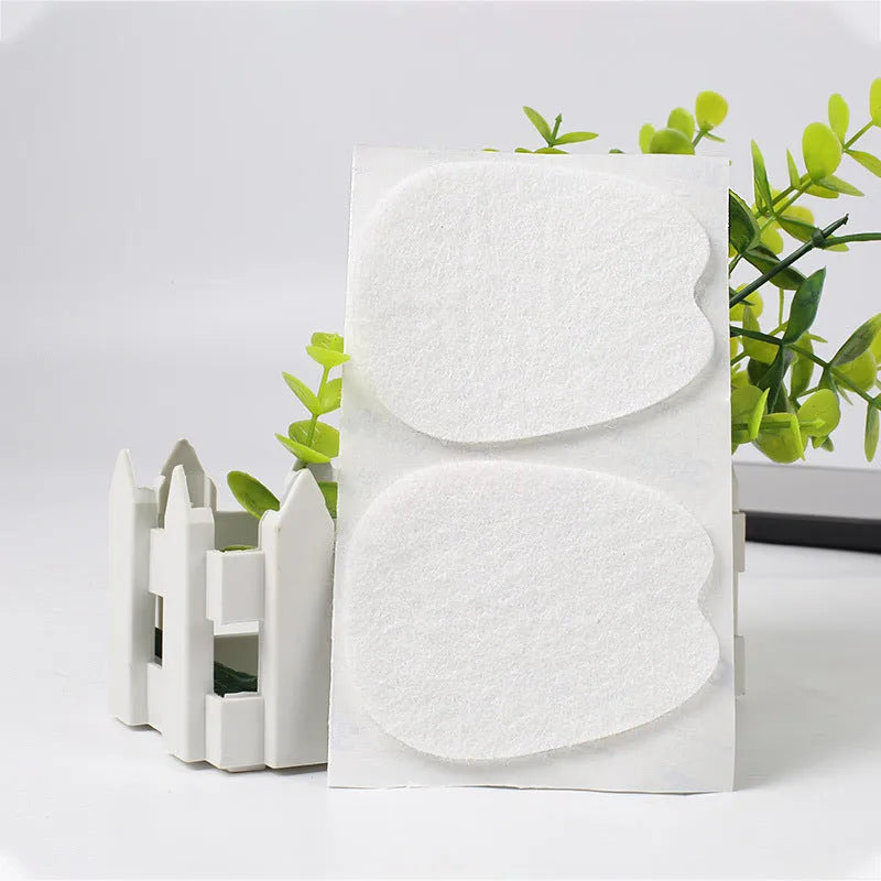 White thin felt self-adhesive patch for protecting the tongue of a shoe from wear.