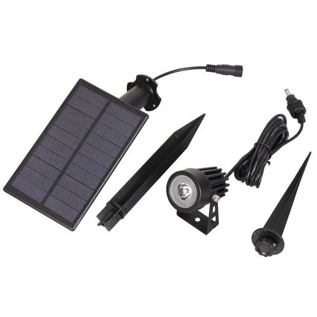 Solar lawn lamp with aluminium frame and white LED panel on grass