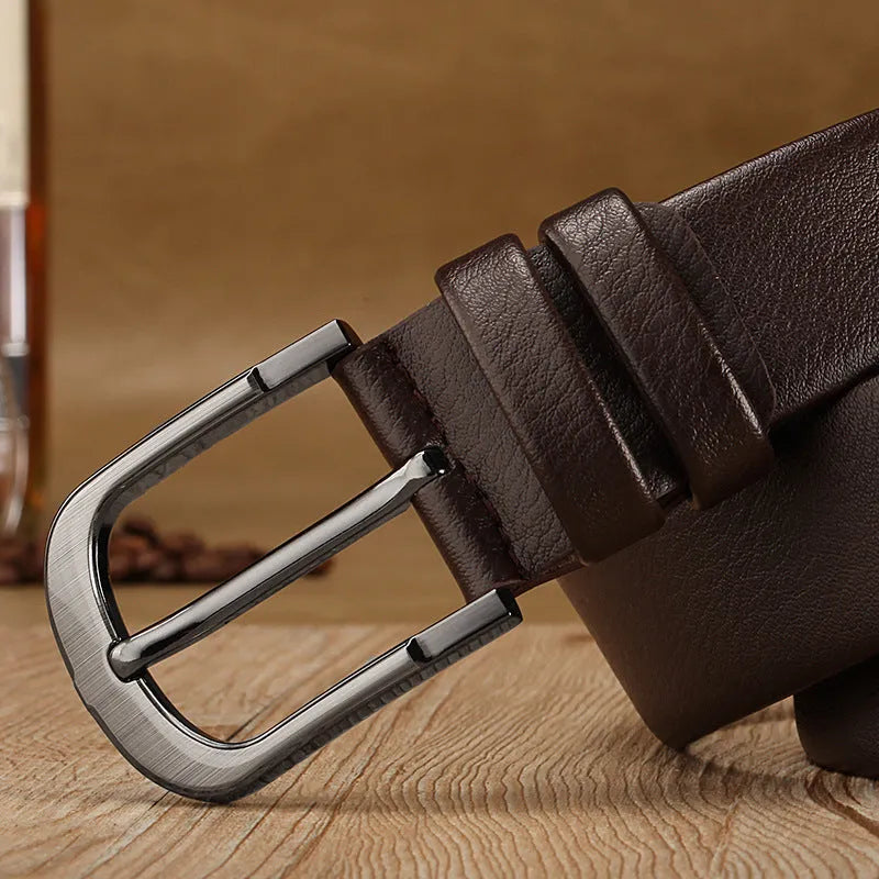 Men's pin buckle belt in black with alloy buckle and imported fibre body shown on a neutral background