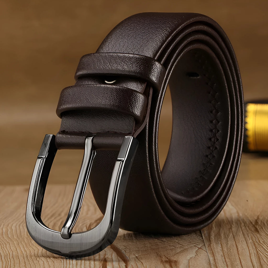 Men's pin buckle belt in black with alloy buckle and imported fibre body shown on a neutral background