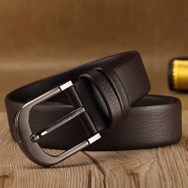 Men's pin buckle belt in black with alloy buckle and imported fibre body shown on a neutral background