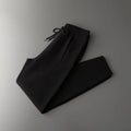 Men's loose cashmere trousers in light camel colour; winter casual wear with elastic waist