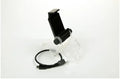 Black PS4 controller mobile game clip holding a smartphone, with included OTG cable for connection.