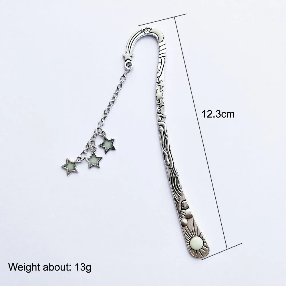 Retro five-pointed star glowing metal bookmark with celestial sun moon star design and fluorescent finish
