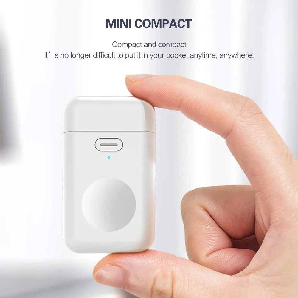 White wireless magnetic portable charger power bank for Apple Watch next to a watch