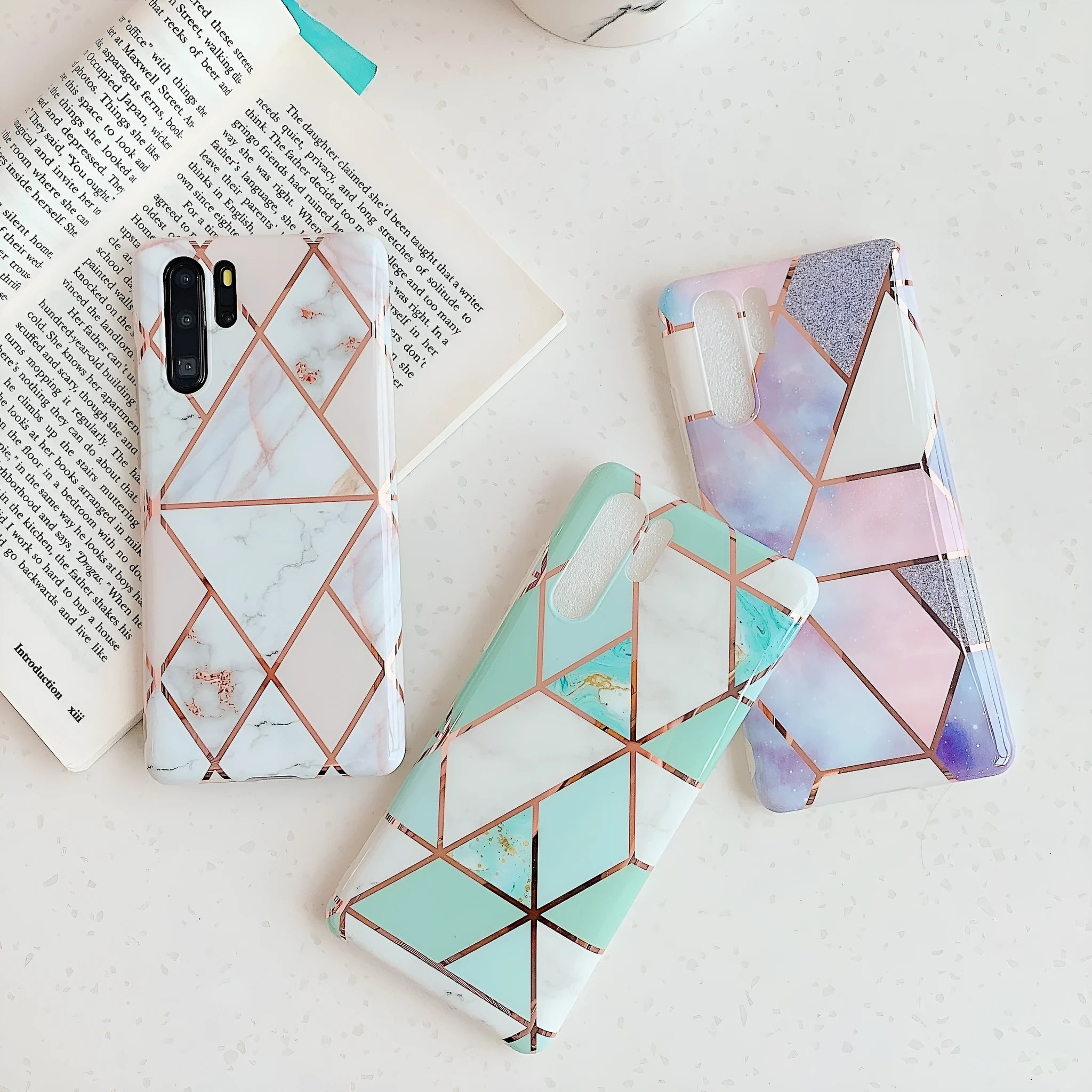 Electroplated marble finish TPU mobile phone case for Huawei and Samsung smartphones in various colours.