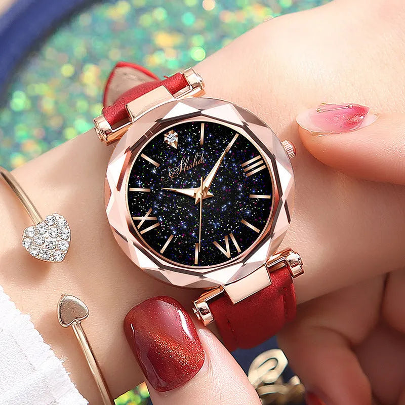 Frosted belt watch with round starry sky dial, Roman numerals, rhinestones, and brown leather strap