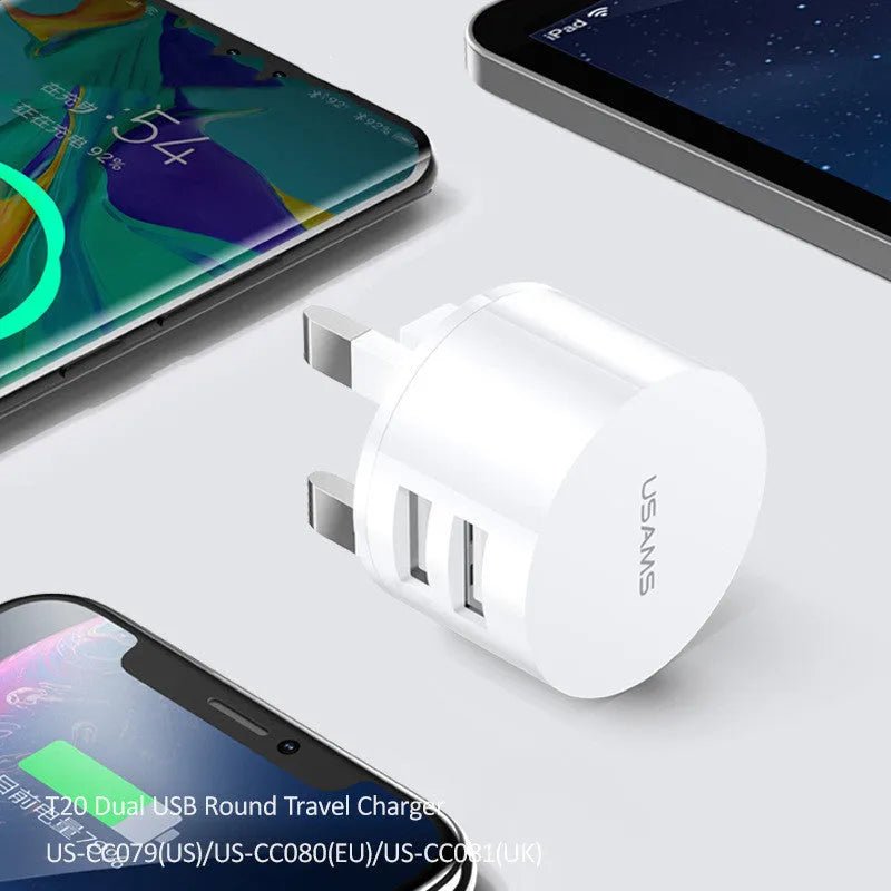 White portable universal dual USB phone charger with US, EU and UK plugs