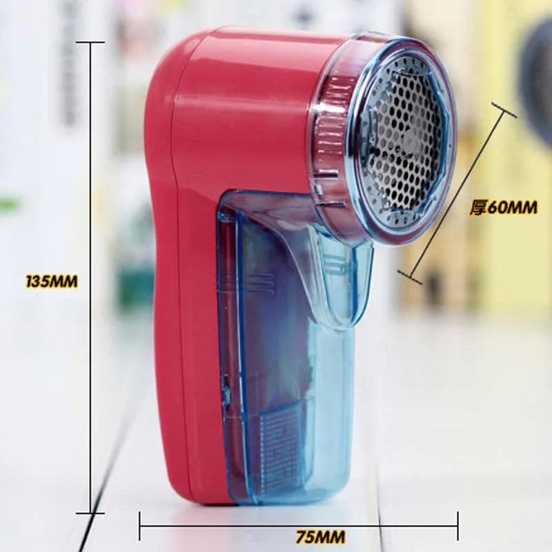 Portable electric lint remover device for removing pills from sweaters and fabrics