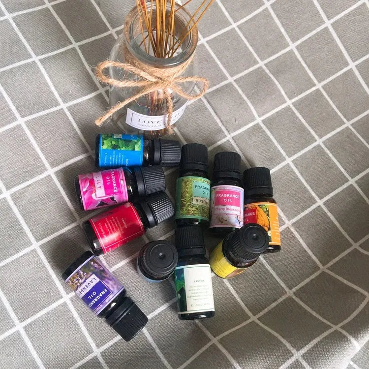 Plant aromatherapy essential oil bottle with 12 fragrance options including Lavender, Lemon, and Rose