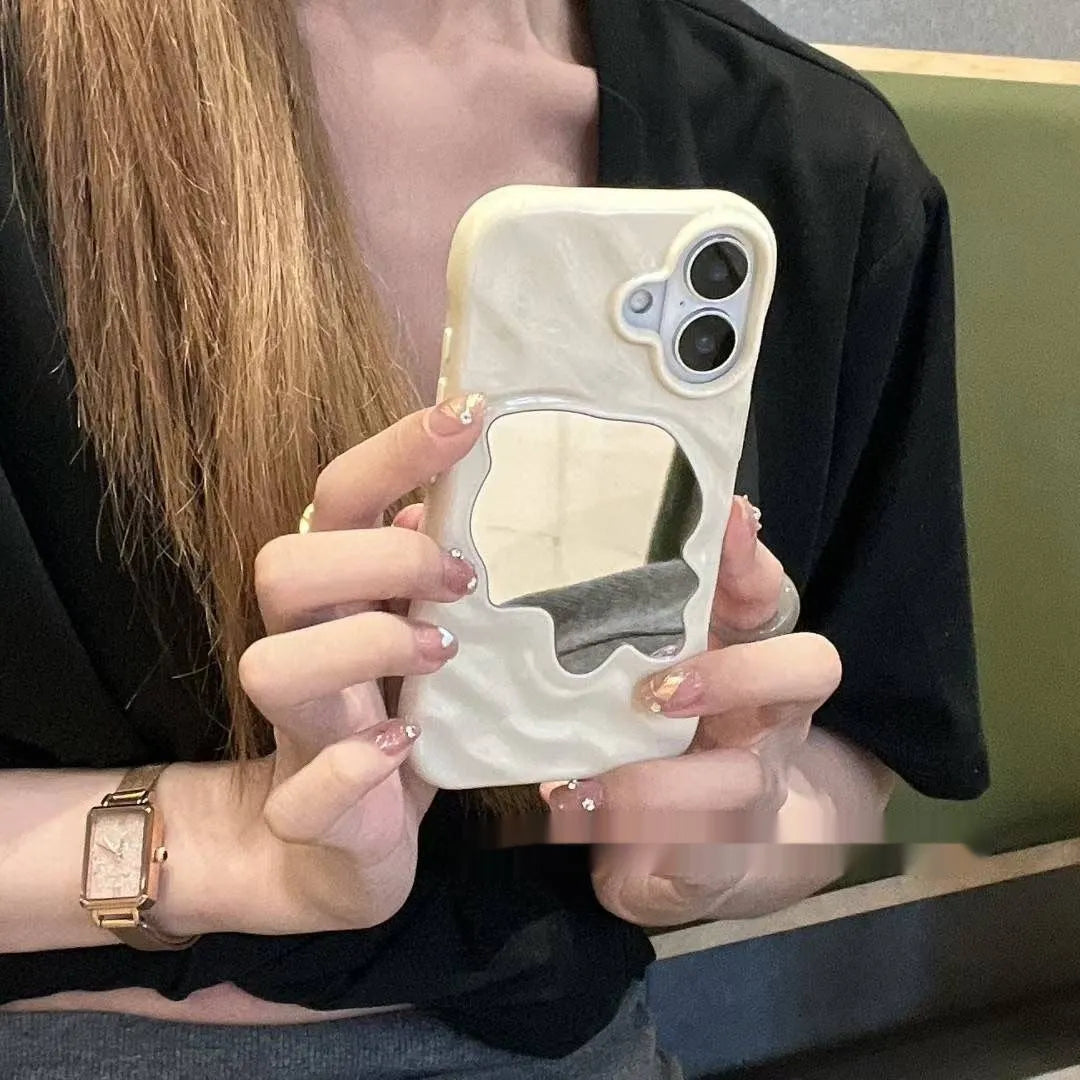 Solid colour iPhone case with water ripple texture and a small mirror, shown on a phone.