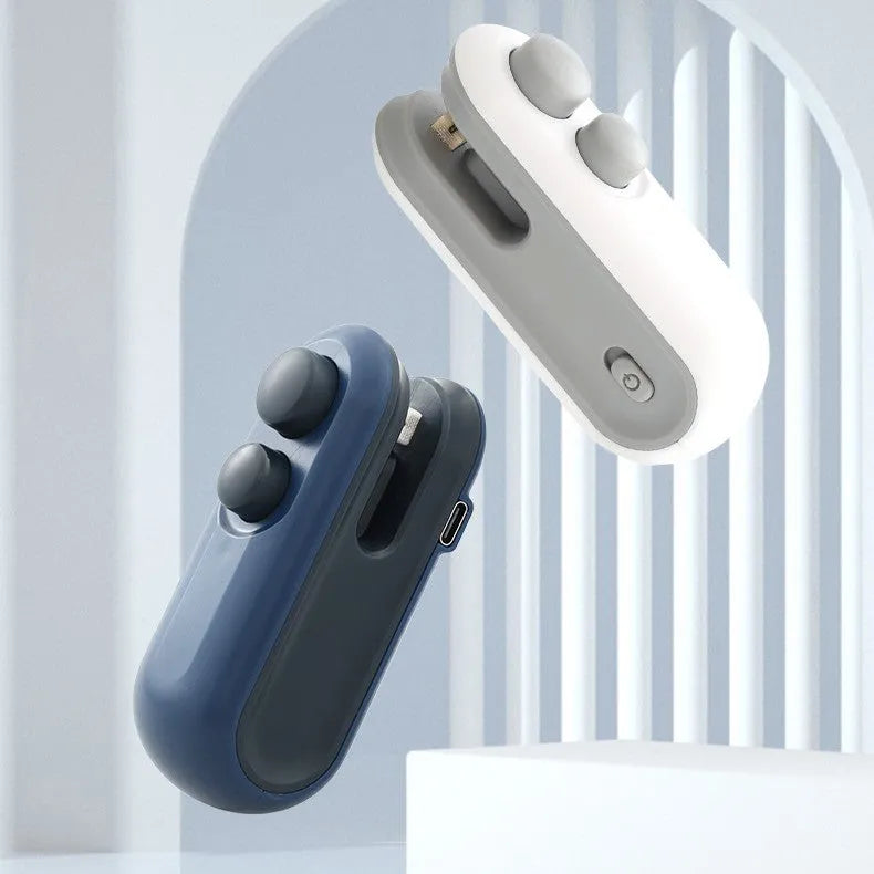 Blue handheld USB heat sealer with magnetic back and cutter blade for sealing chip bags