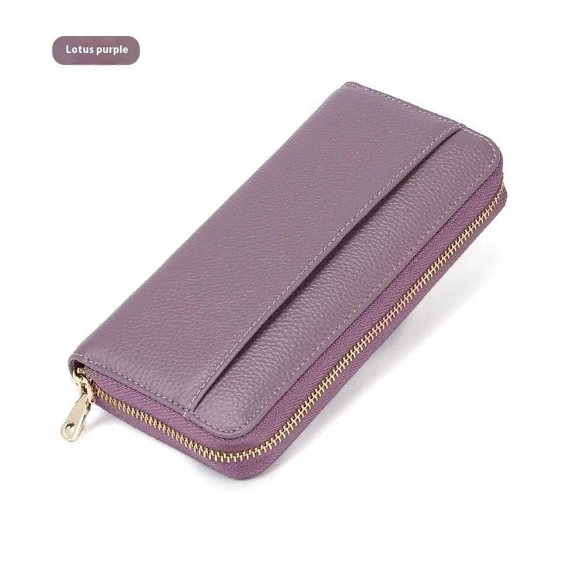 Long genuine leather women's wallet in solid colour with anti-theft card swiping feature
