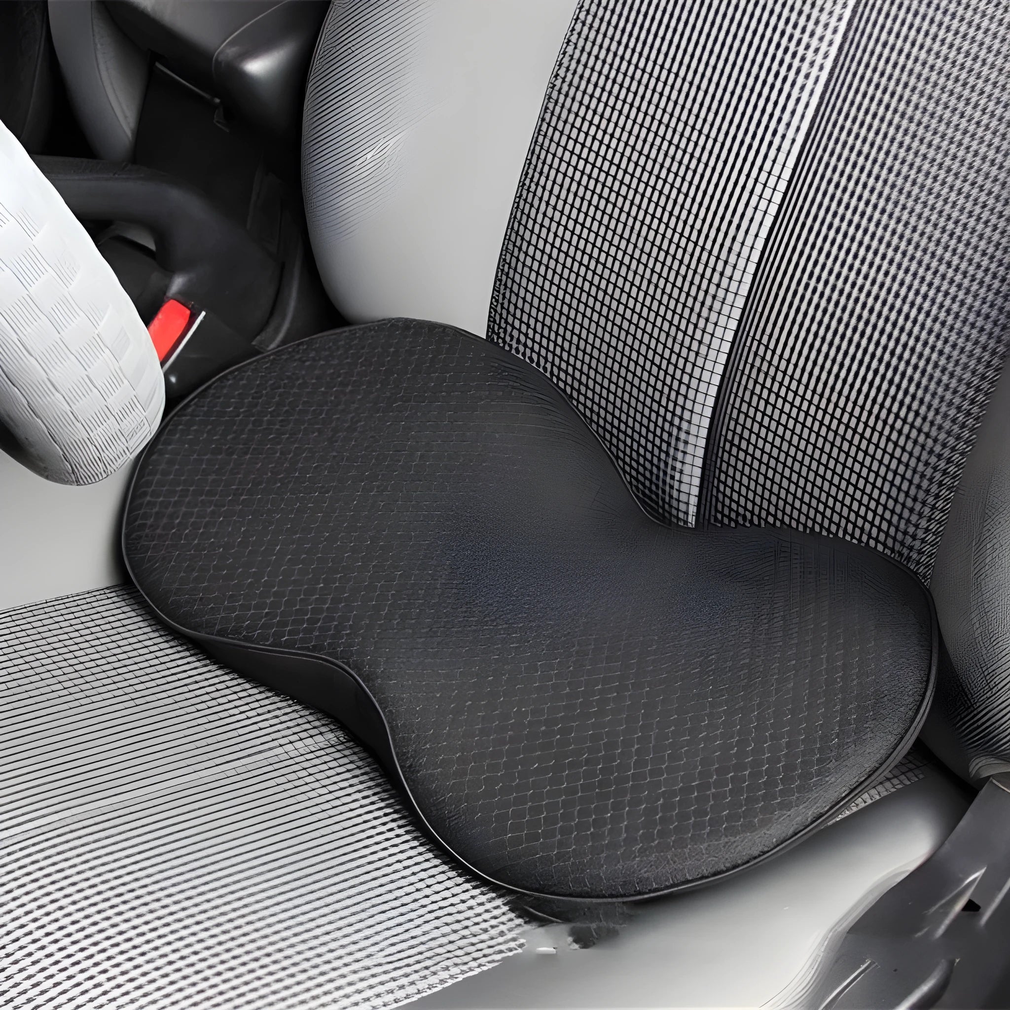 A flat car seat cushion with memory foam filler shown in a choice of four colours.