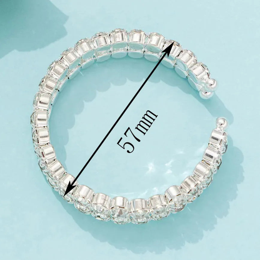 Silver elastic bracelet with double row of large rhinestones and wide opening design