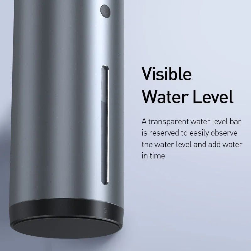Black aluminium alloy car humidifier and air purifier with USB cable on a desk