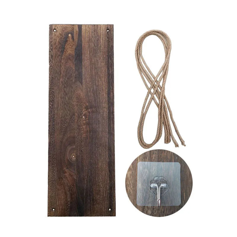 Wooden swing wall-mounted shelf in black or white, small 35cm or large 45cm, with twine cord and hooks for plants and crafts.