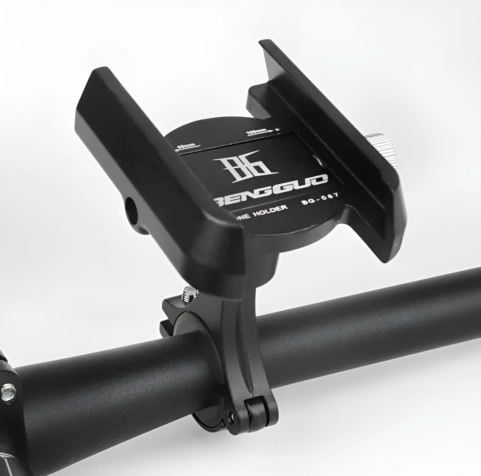 Aluminium bicycle phone holder mounted on handlebar with phone inserted, showing black finish
