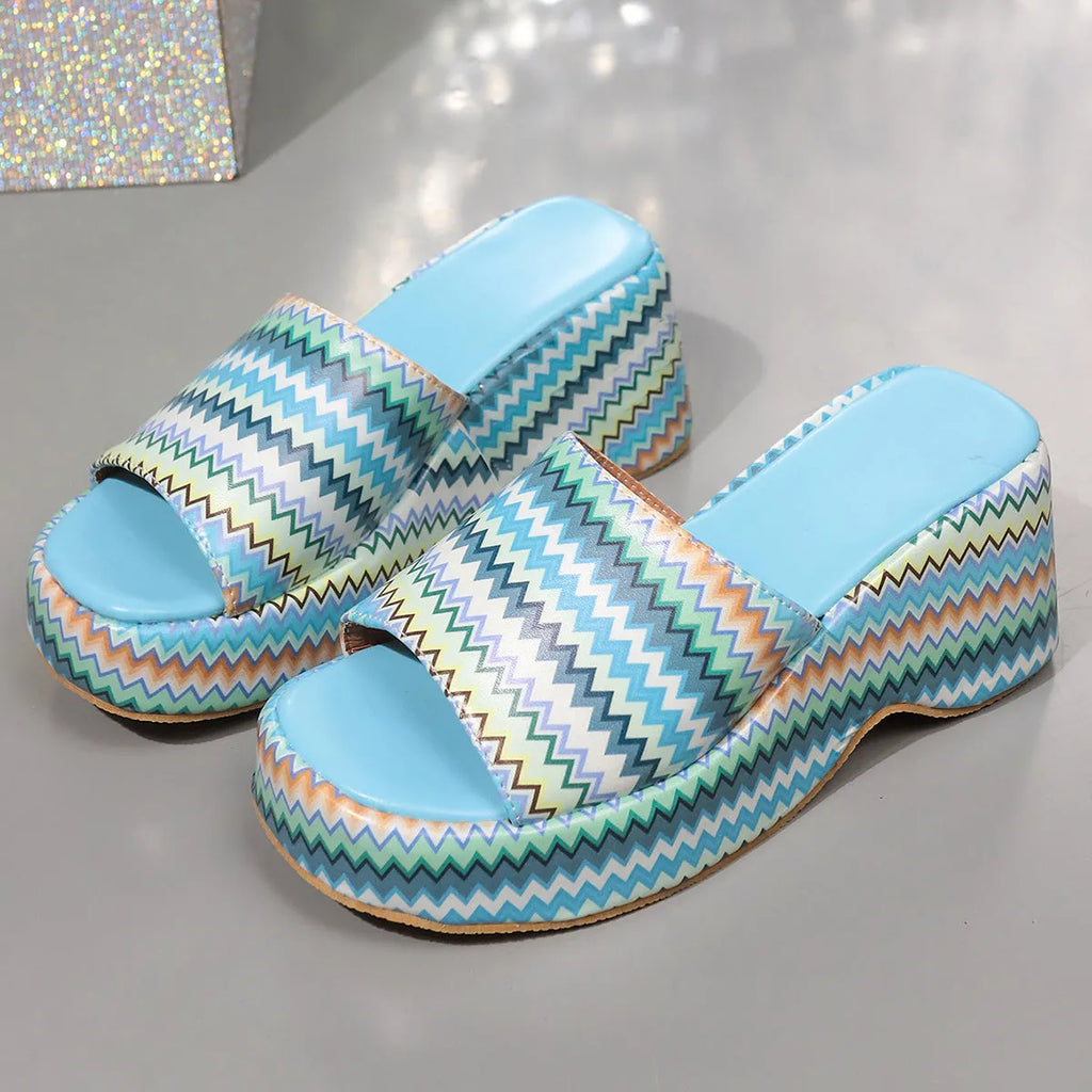 Colourful wave print wedge sandals for women with fish mouth open toe and rubber sole.