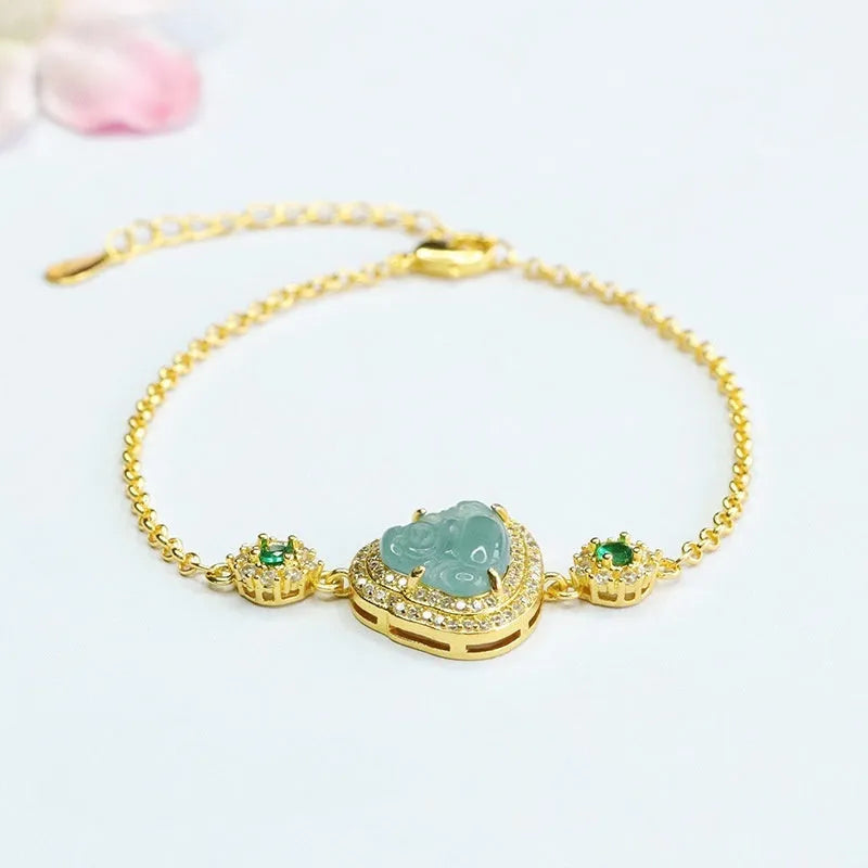 Blue jade bracelet with carved Maitreya Buddha, 10x13mm, inlaid design.