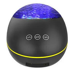 Coversage ocean wave projector LED night light with Bluetooth speaker in black, showing wave projection on wall