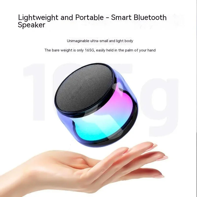 Black pistol-shaped Bluetooth speaker with colour glaze finish on desktop