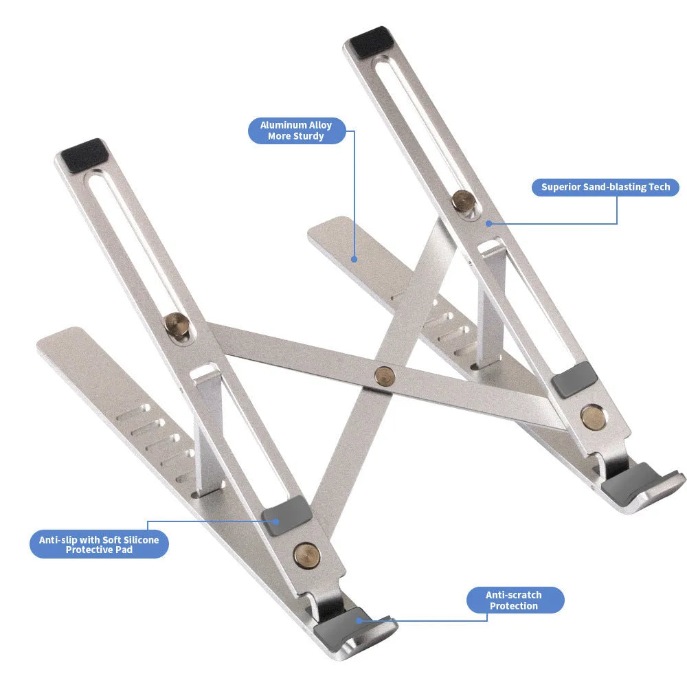 Silver aluminium laptop stand folded flat next to an open laptop, showing its six-angle adjustment hinge.