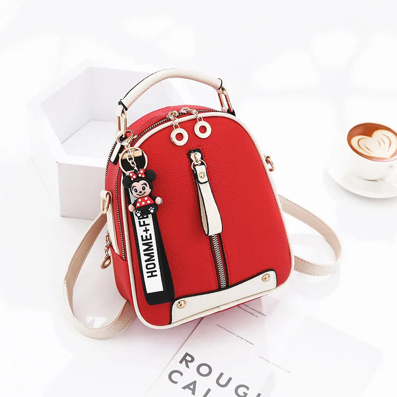 PU leather women's backpack with car suture design, oval shape, and internal zipper pocket