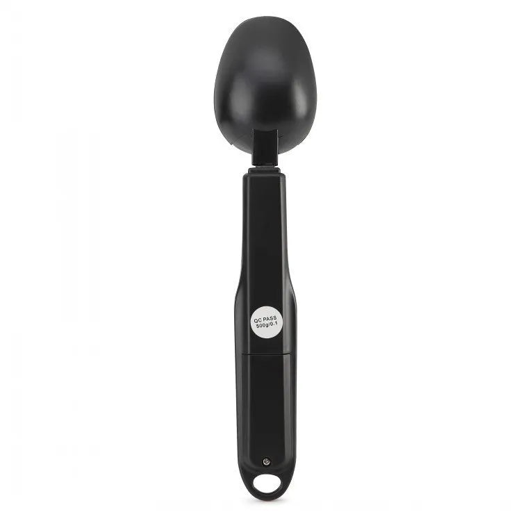 Digital measuring spoon with electronic display showing weight measurement in grams
