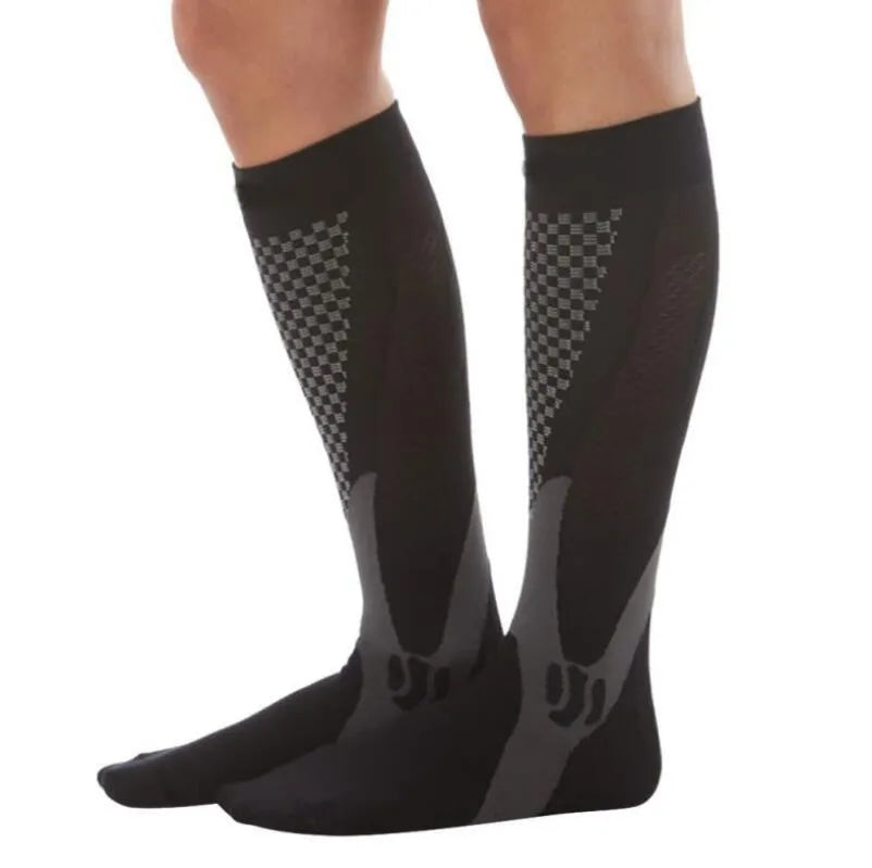 Graduated compression socks for men and women in black, shown in S/M, L/XL, and XXL sizes.