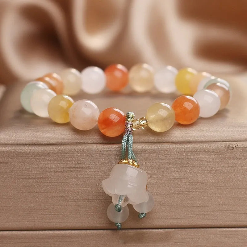 Natural Jinsi Jade beaded bracelet for women with round beads and lily pendant in jade colour