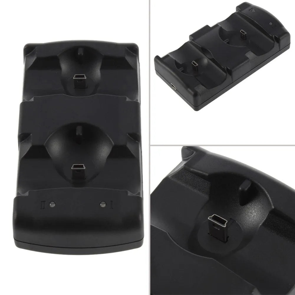 Black PS3 dual charging dock with two wireless controllers inserted, connected to console via USB cable.