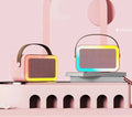 Portable Bluetooth karaoke speaker with microphone and coloured LED lights in pink, sky blue, and white colour options.