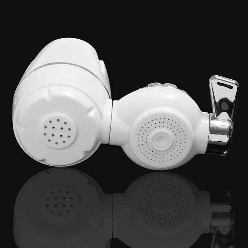 White plastic faucet water filter unit with adapters and ceramic cartridge for kitchen tap installation.