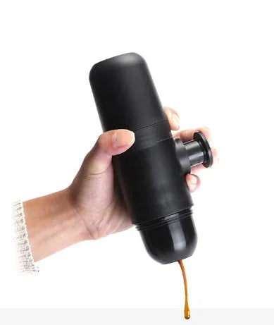 Black portable manual coffee machine with compact 6x17.5cm dimensions