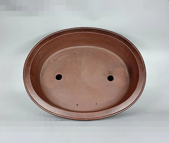 Handmade antique oval Yixing Purple Mud bonsai pot with dimensions 66x53x14.5cm for pine and cypress