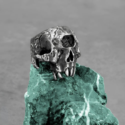 Alloy skull ring with one-eyed design in electroplated finish showing retro punk styling