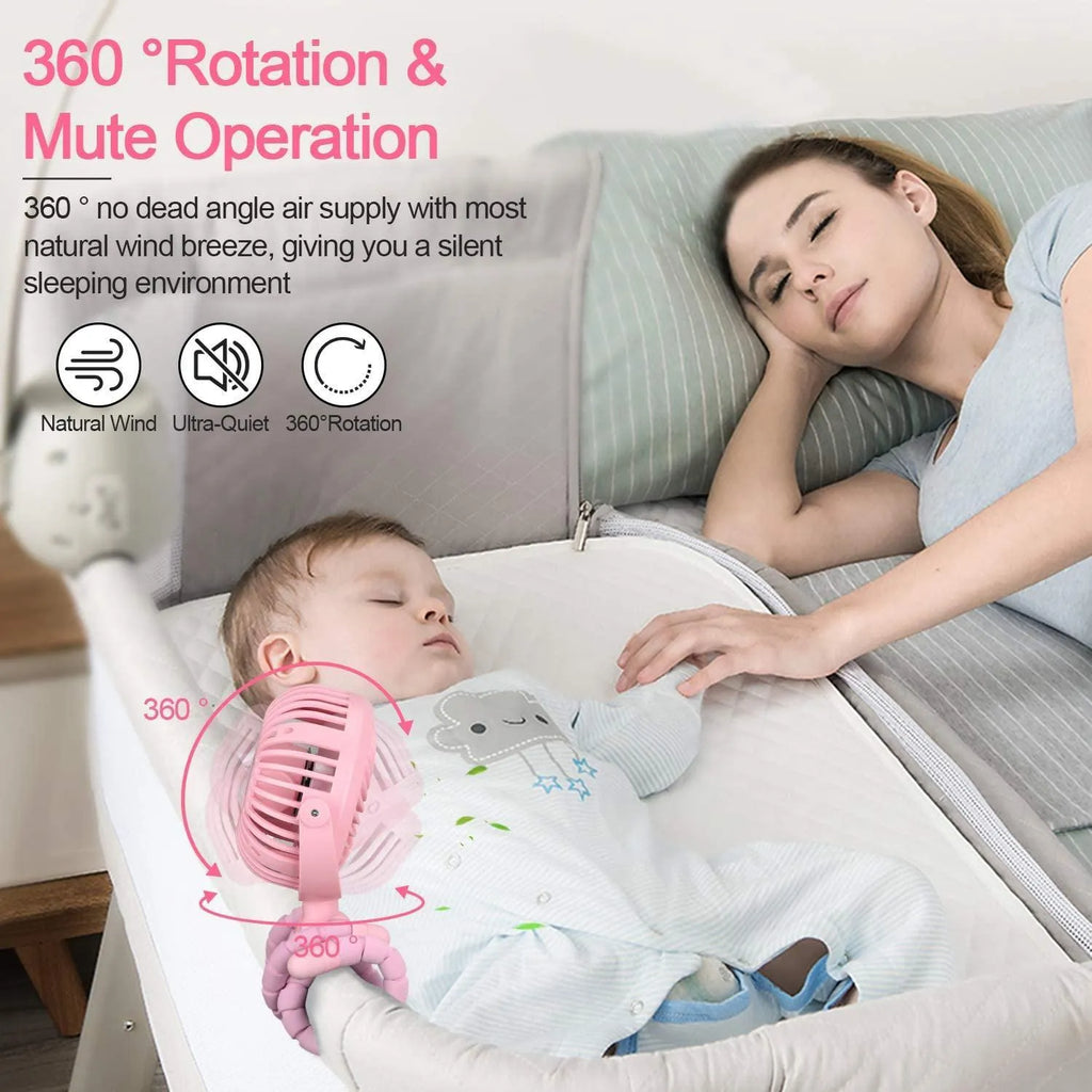 Pink portable USB rechargeable fan with animal design and clip attached to a stroller handle.