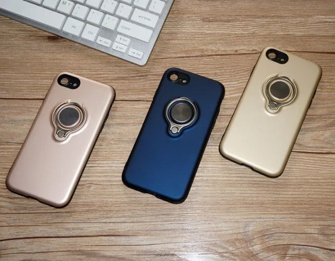 Slim black magnetic back cover case for iPhone on a magnetic car vent mount.