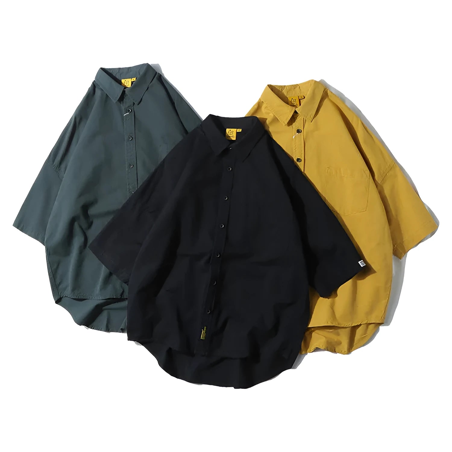 Man wearing a loose-fit cotton cardigan shirt in a solid colour, showcasing the Japanese-inspired summer style.